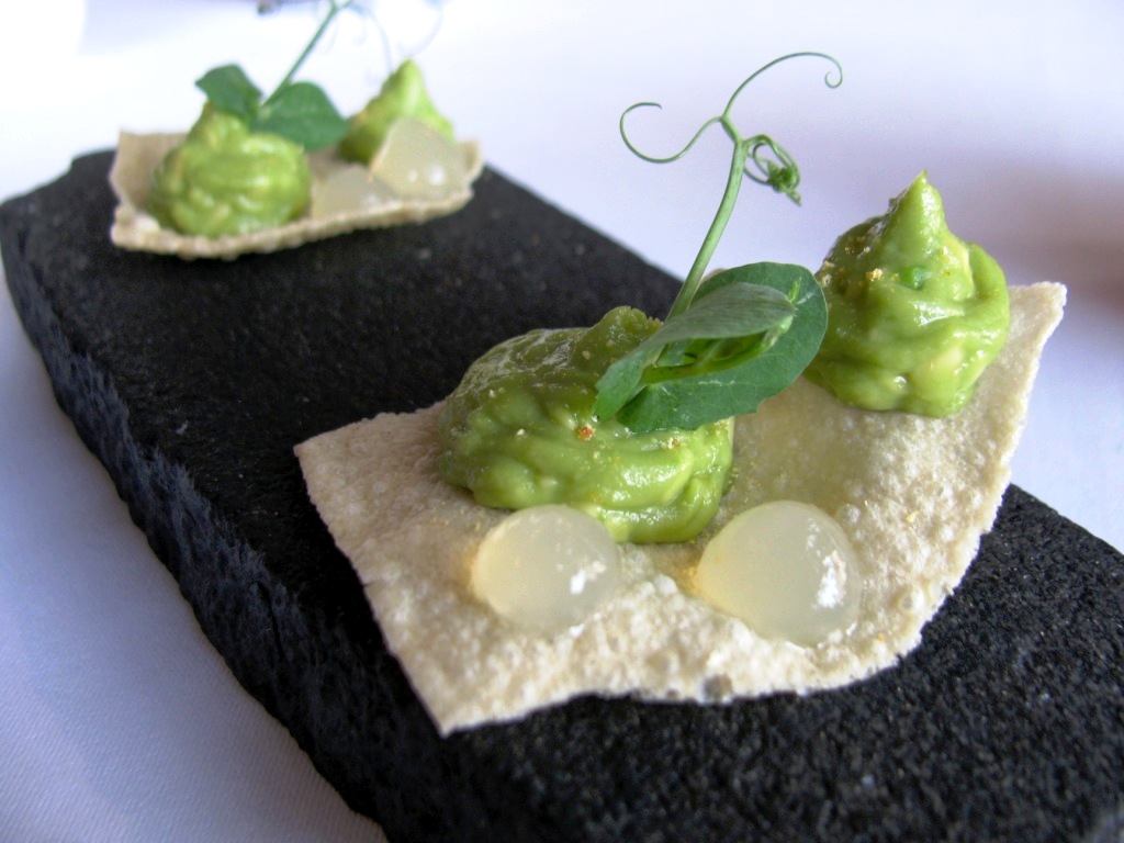 Poppadom crackers with wasabi cream for welcome.